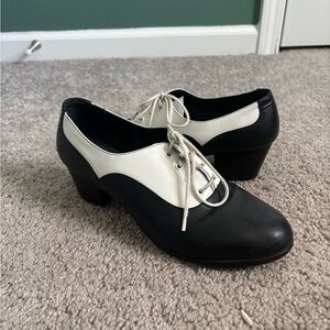 Capezio Black and white dance oxfords with a 2-inch heel
Size 8 
Light wear